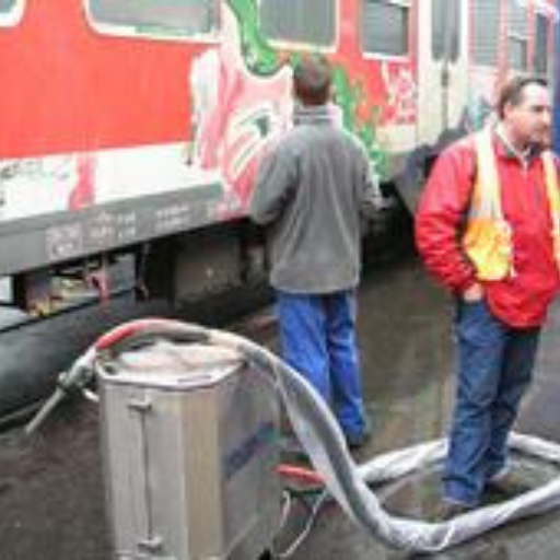 Paint stripping trains & trucks with dry ice