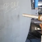 Cleaning with dry ice and abrasives in chemical industry