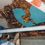 Paint stripping boats, machine parts, ...